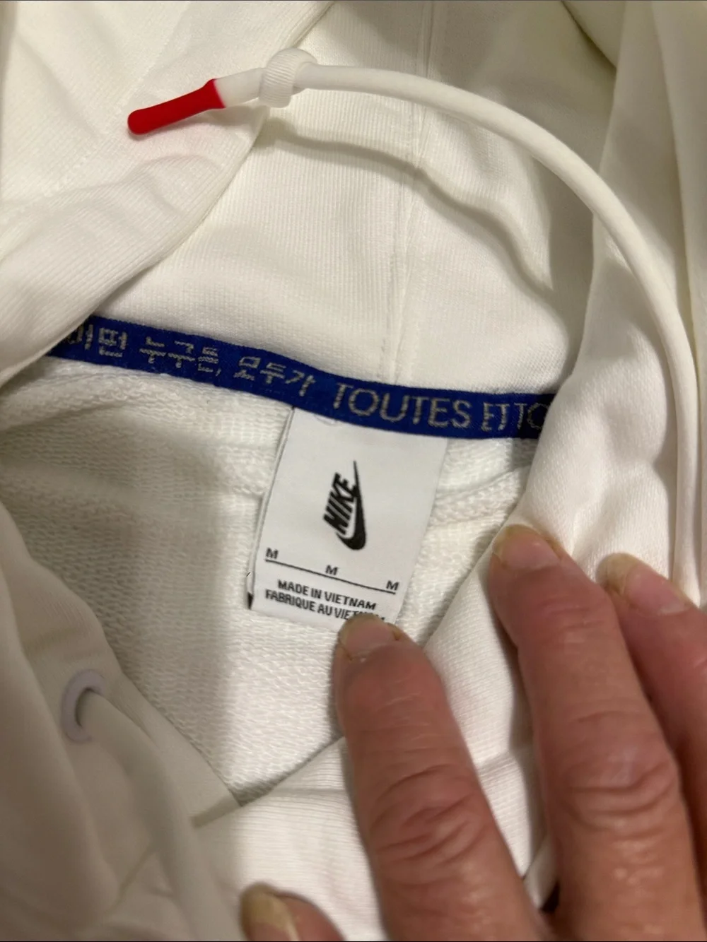 Nike White Hoodie with Red Smiley Stripes and Blue Accents